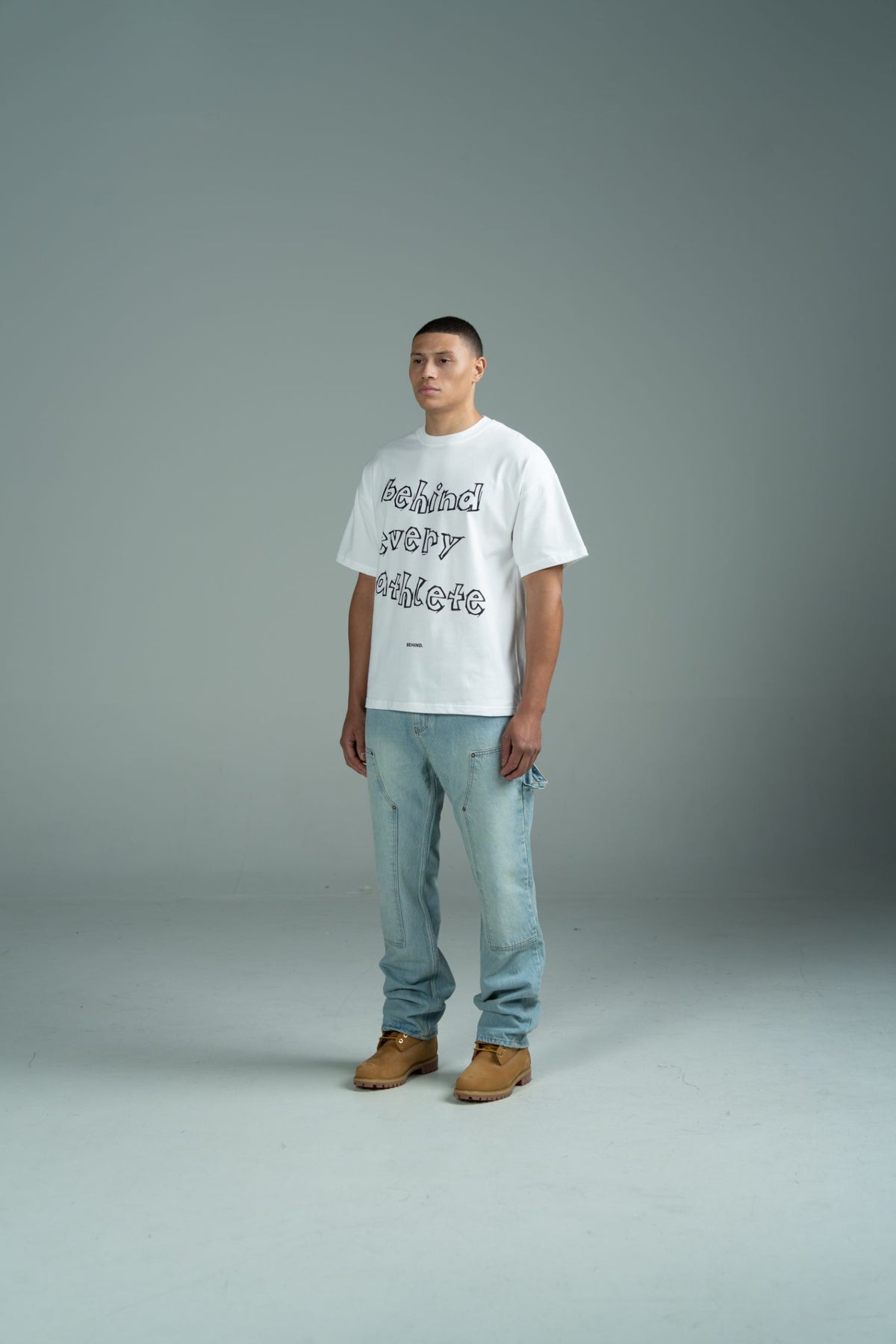 Behind Every Athlete Tee